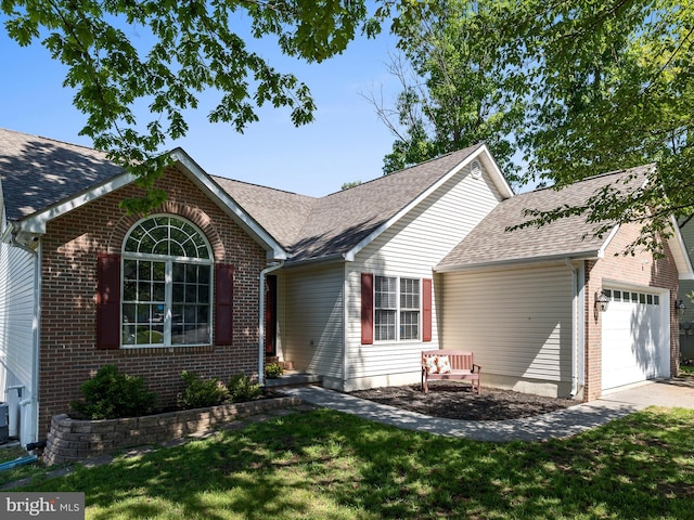 112 Rebels Cir, Winchester, VA 22602 - ranch-style house featuring a garage, brick siding, a shingled roof, and a front lawn