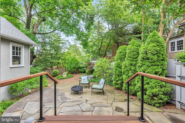 16 Southgate Ave, Annapolis, MD 21401 - wooden terrace featuring a patio, view of scattered trees, and a fire pit