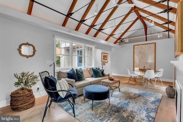 16 Southgate Ave, Annapolis, MD 21401 - living room featuring high vaulted ceiling, baseboards, beamed ceiling, and wood finished floors