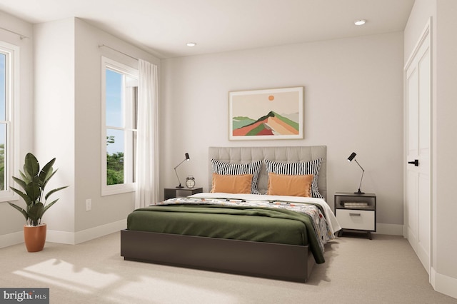 carpeted bedroom with recessed lighting and baseboards
