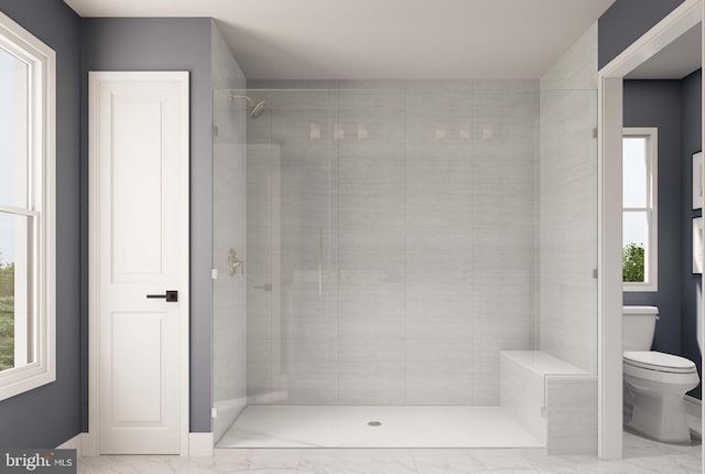 full bath with plenty of natural light, a shower stall, and marble finish floor