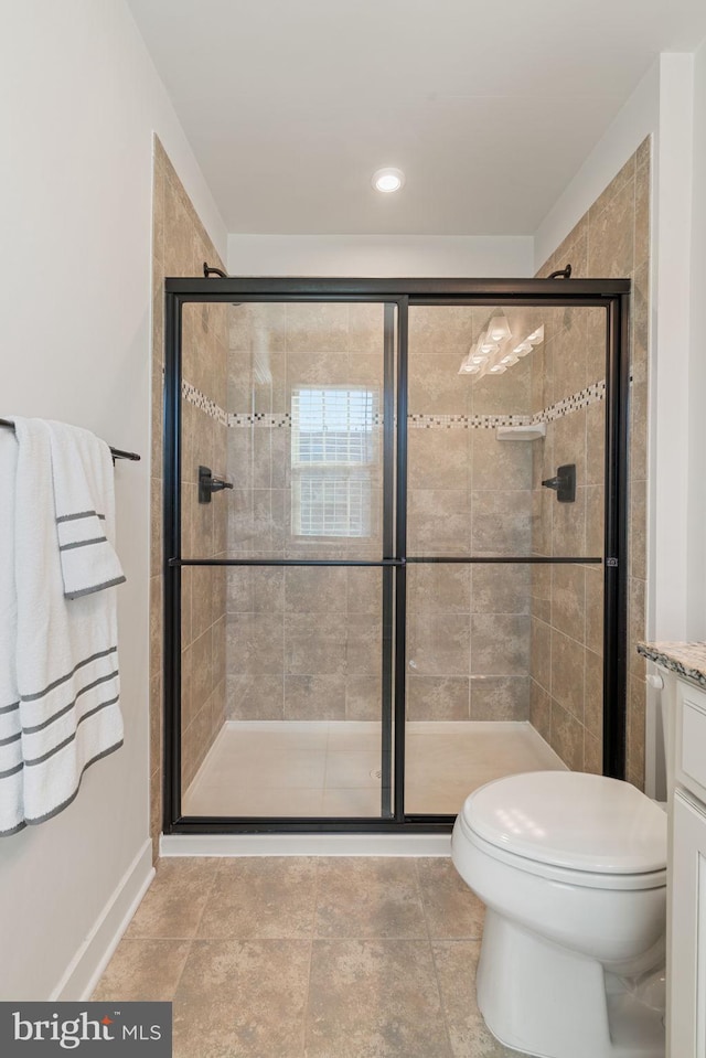 18095 Red Mulberry Rd, Dumfries, VA 22026 - bathroom featuring a shower stall, toilet, and baseboards
