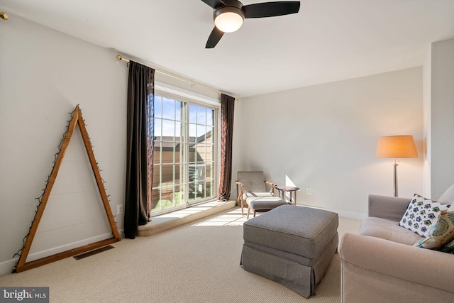 18095 Red Mulberry Rd, Dumfries, VA 22026 - living room with carpet floors, baseboards, and a ceiling fan