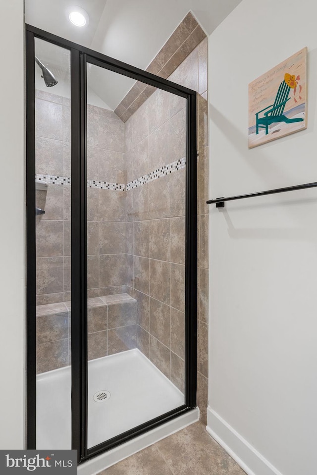 18095 Red Mulberry Rd, Dumfries, VA 22026 - bathroom featuring a stall shower and baseboards