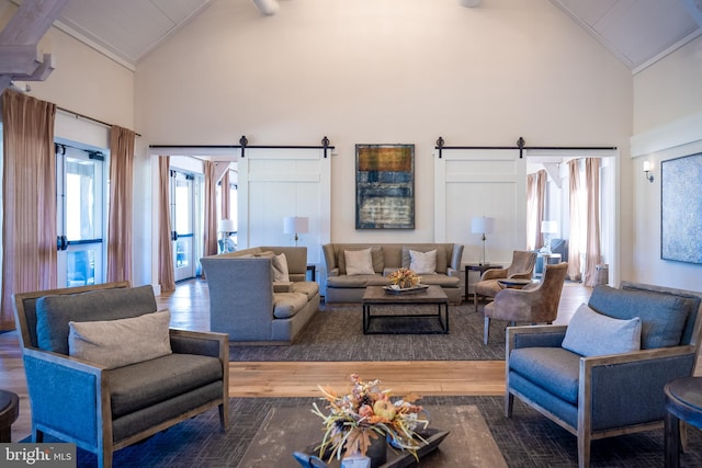 18095 Red Mulberry Rd, Dumfries, VA 22026 - living room with a barn door, high vaulted ceiling, wood-type flooring, beam ceiling, and wood ceiling