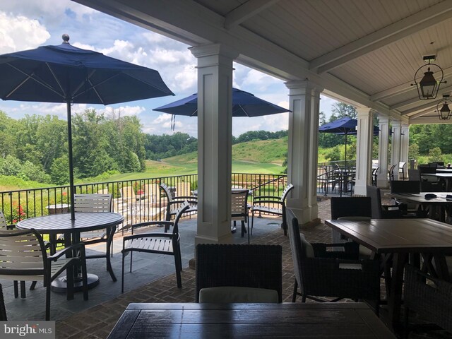 18095 Red Mulberry Rd, Dumfries, VA 22026 - view of patio / terrace with outdoor dining area and ceiling fan