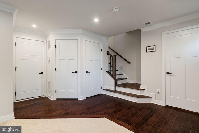 18095 Red Mulberry Rd, Dumfries, VA 22026 - entrance foyer with dark wood-style flooring, stairs, recessed lighting, and baseboards