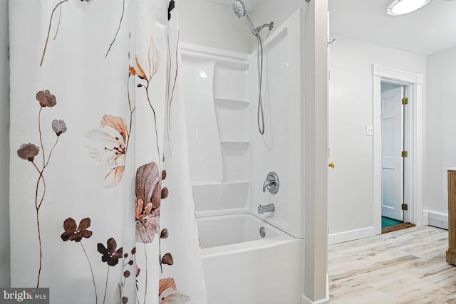 full bath with baseboards, shower / bath combination with curtain, and wood finished floors