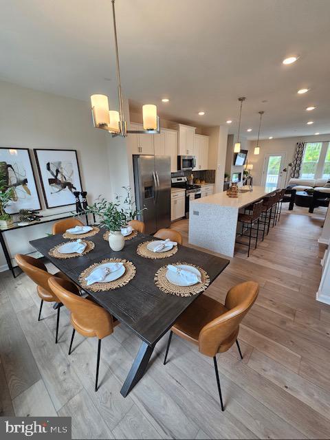 7304 Roxy Run, Clinton, MD 20735 - dining room featuring light wood-style floors and recessed lighting