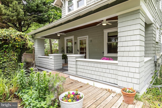 exterior space with covered porch and ceiling fan