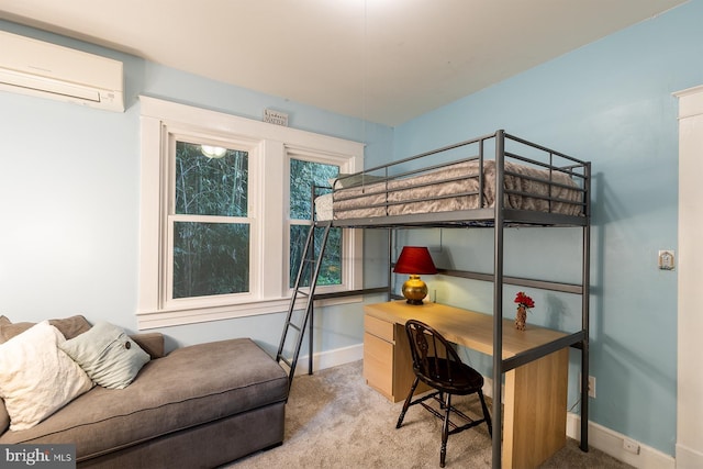 bedroom with carpet, baseboards, and a wall unit AC