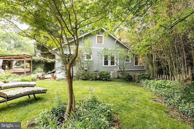 exterior space featuring a lawn and a chimney