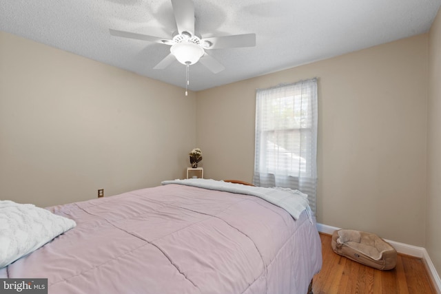 412 Linda Ave, Linthicum Heights, MD 21090 - bedroom featuring wood finished floors, baseboards, and ceiling fan