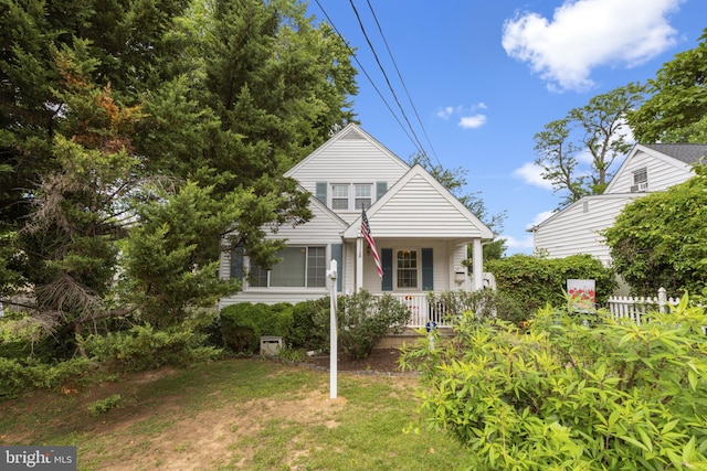 412 Linda Ave, Linthicum Heights, MD 21090 - view of front of house featuring covered porch and a front lawn