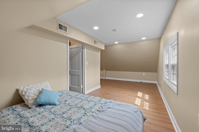 412 Linda Ave, Linthicum Heights, MD 21090 - bedroom with wood finished floors, recessed lighting, lofted ceiling, and baseboards