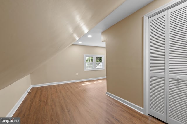 412 Linda Ave, Linthicum Heights, MD 21090 - bonus room featuring wood finished floors, baseboards, recessed lighting, and lofted ceiling