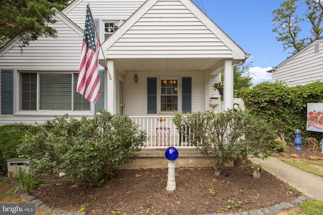 412 Linda Ave, Linthicum Heights, MD 21090 - view of front facade with a porch