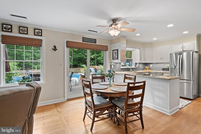 8543 Ingleton Rd, Easton, MD 21601 - dining room with a ceiling fan, light wood-style flooring, crown molding, baseboards, and recessed lighting