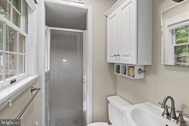 8543 Ingleton Rd, Easton, MD 21601 - bathroom featuring a sink, a stall shower, and toilet