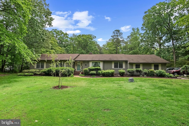 8543 Ingleton Rd, Easton, MD 21601 - ranch-style house with a front yard and a chimney