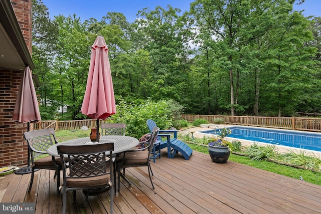 8543 Ingleton Rd, Easton, MD 21601 - deck featuring outdoor dining area and a fenced backyard