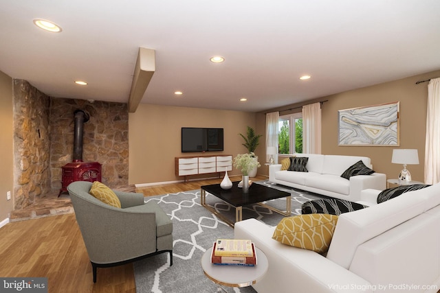 4537 Kavan Ct, Doylestown, PA 18902 - living room featuring wood finished floors, a wood stove, and recessed lighting