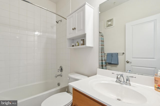 full bath featuring toilet, tub / shower combination, and vanity