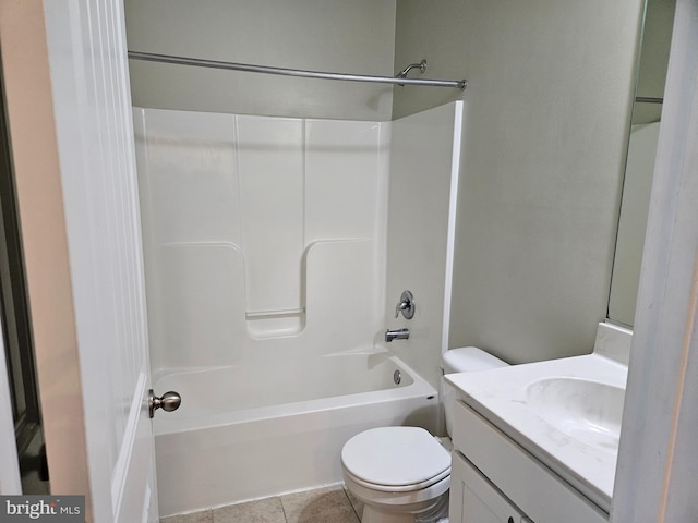 full bath featuring toilet, tile patterned floors, shower / bathing tub combination, and vanity