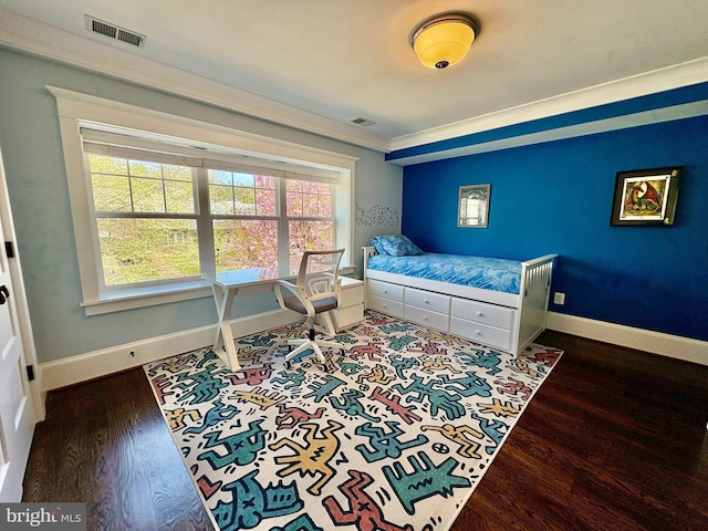 3612 S St NW, Washington, DC 20007 - bedroom featuring crown molding, visible vents, and wood finished floors