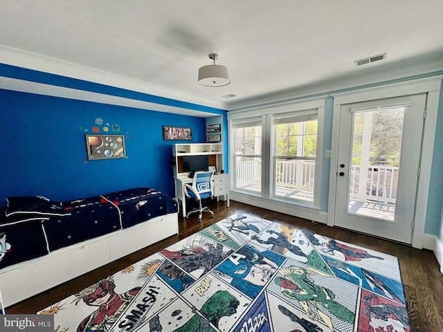 3612 S St NW, Washington, DC 20007 - bedroom featuring ornamental molding, wood finished floors, visible vents, and access to exterior