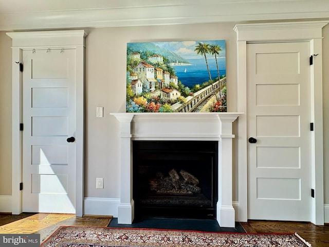 3612 S St NW, Washington, DC 20007 - details with wood finished floors, baseboards, and a fireplace with flush hearth