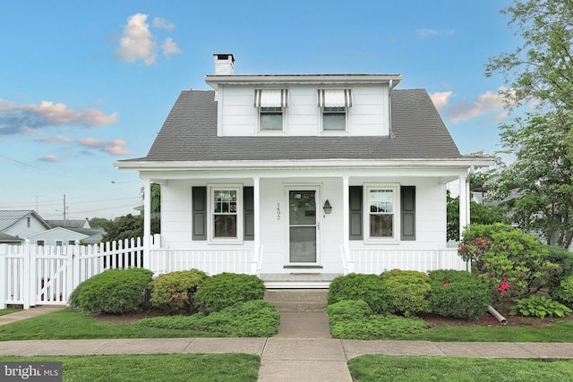 1492 Leonard St, York, PA 17404 - bungalow-style home featuring covered porch, a chimney, and a shingled roof