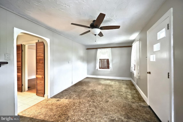 1492 Leonard St, York, PA 17404 - unfurnished bedroom featuring arched walkways, carpet, and a ceiling fan