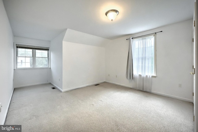 365 Apple Tree Ln, Mount Wolf, PA 17347 - empty room featuring carpet floors, plenty of natural light, and baseboards
