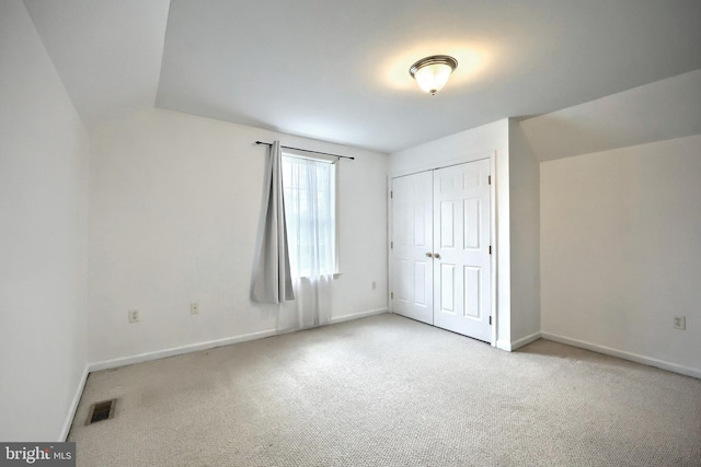 365 Apple Tree Ln, Mount Wolf, PA 17347 - unfurnished bedroom featuring carpet flooring, a closet, and baseboards