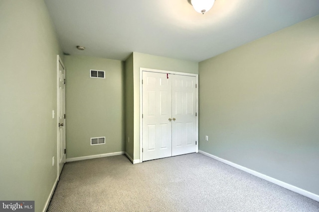 365 Apple Tree Ln, Mount Wolf, PA 17347 - unfurnished bedroom featuring baseboards, a closet, and carpet floors