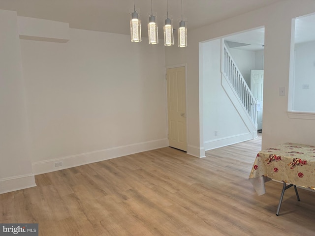 730 Third, Lansdale, PA 19446 - dining room with stairway, baseboards, and light wood finished floors