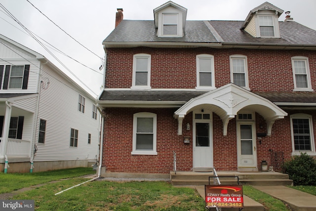 730 Third, Lansdale, PA 19446 - multi unit property with roof with shingles, a chimney, a front lawn, and brick siding