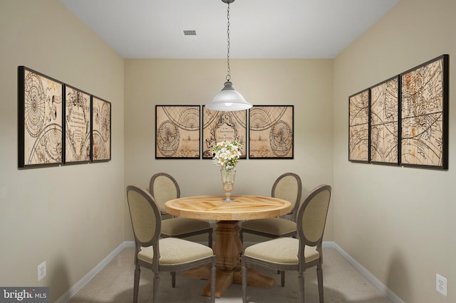 8603 Wintergreen Ct Unit 201, Odenton, MD 21113 - carpeted dining room featuring baseboards