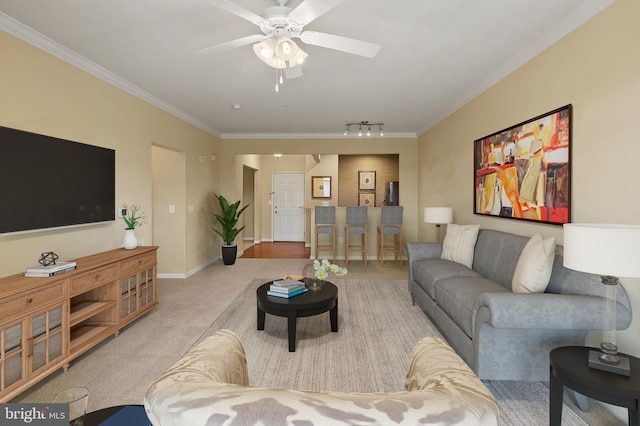 8603 Wintergreen Ct Unit 201, Odenton, MD 21113 - living room featuring carpet, a ceiling fan, crown molding, track lighting, and baseboards