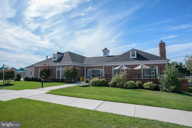 8603 Wintergreen Ct Unit 201, Odenton, MD 21113 - view of front of house featuring brick siding and a front lawn