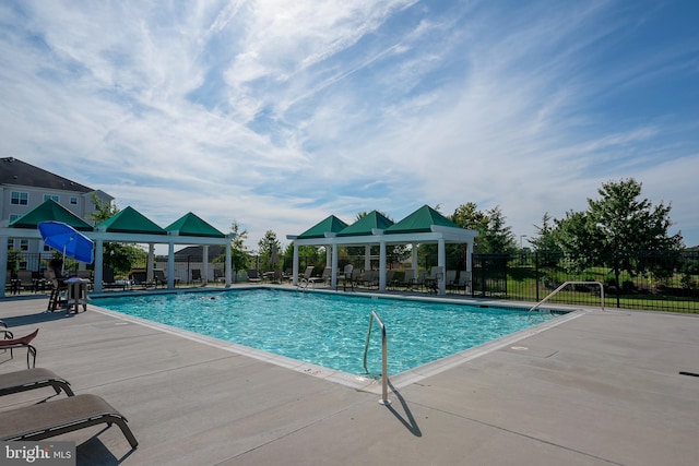 8603 Wintergreen Ct Unit 201, Odenton, MD 21113 - community pool featuring a gazebo, fence, and a patio area