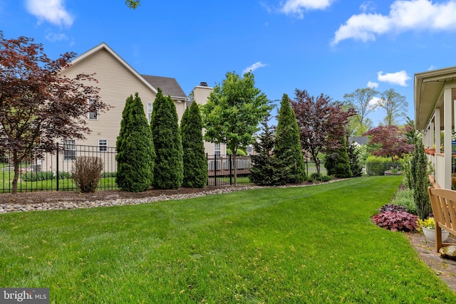 view of yard with fence