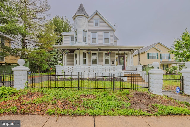 3614 Keene Ave, Baltimore, MD 21214 - victorian house featuring covered porch and a fenced front yard