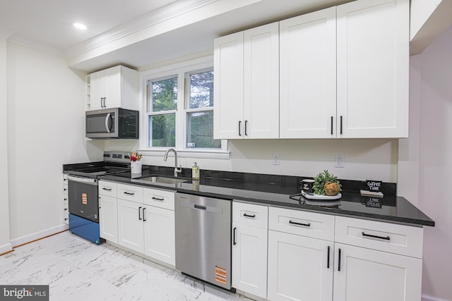 3614 Keene Ave, Baltimore, MD 21214 - kitchen with stainless steel appliances, a sink, white cabinets, baseboards, and crown molding