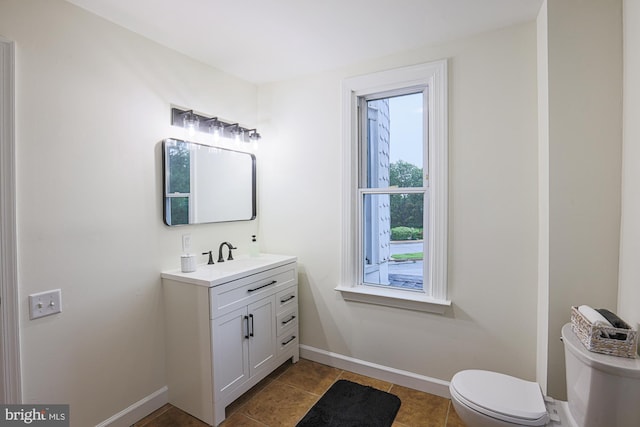 3614 Keene Ave, Baltimore, MD 21214 - bathroom featuring toilet, baseboards, vanity, and tile patterned floors