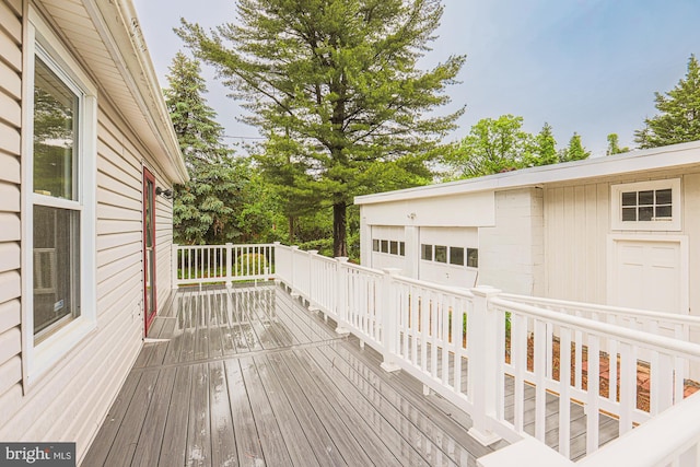 3614 Keene Ave, Baltimore, MD 21214 - wooden terrace featuring an outdoor structure and a detached garage