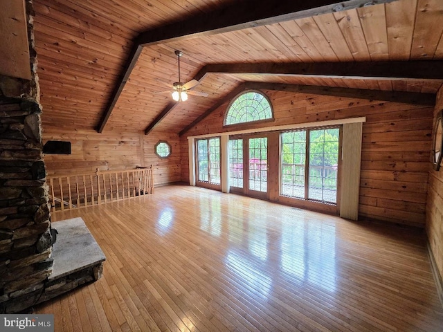 5925 Huntingtown Rd, Huntingtown, MD 20639 - unfurnished living room featuring a ceiling fan, hardwood / wood-style floors, wooden walls, wood ceiling, and lofted ceiling with beams