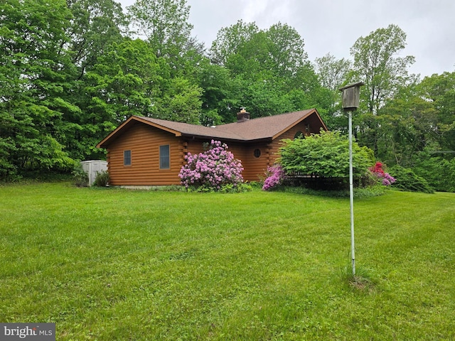 5925 Huntingtown Rd, Huntingtown, MD 20639 - exterior space featuring a chimney, a front yard, and log siding