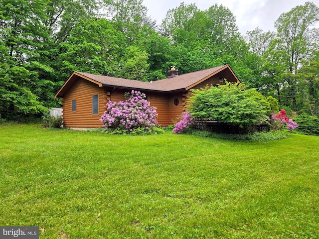 5925 Huntingtown Rd, Huntingtown, MD 20639 - view of front of property with log exterior, a front lawn, and a chimney